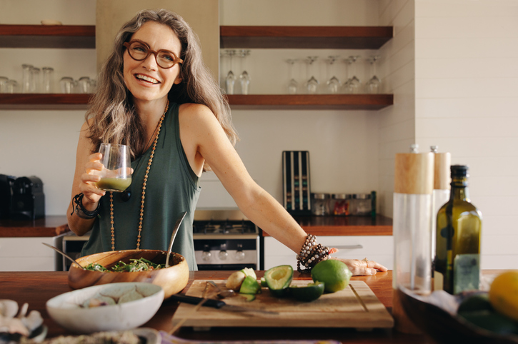 A woman following money-saving tips at home as part of the Financial Independence Retire Early (FIRE) movement.