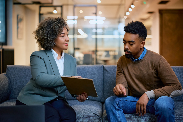 A financial advisor working with a client to create a retirement plan.