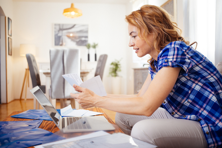 An employee can review their 401(k) plan to adjust contributions based on current finances and future retirement goals.